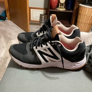 New Balance turf shoes.  Used, but in great condition, just a little small 4 me